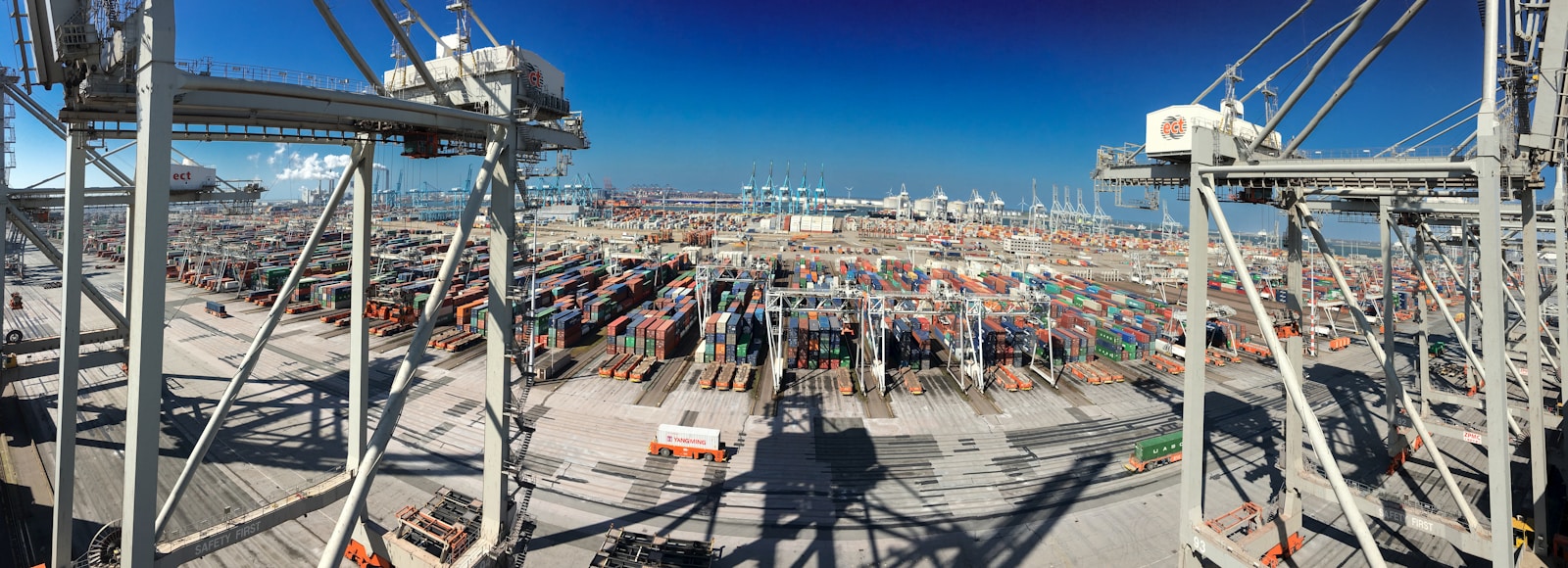 a large container yard filled with lots of containers