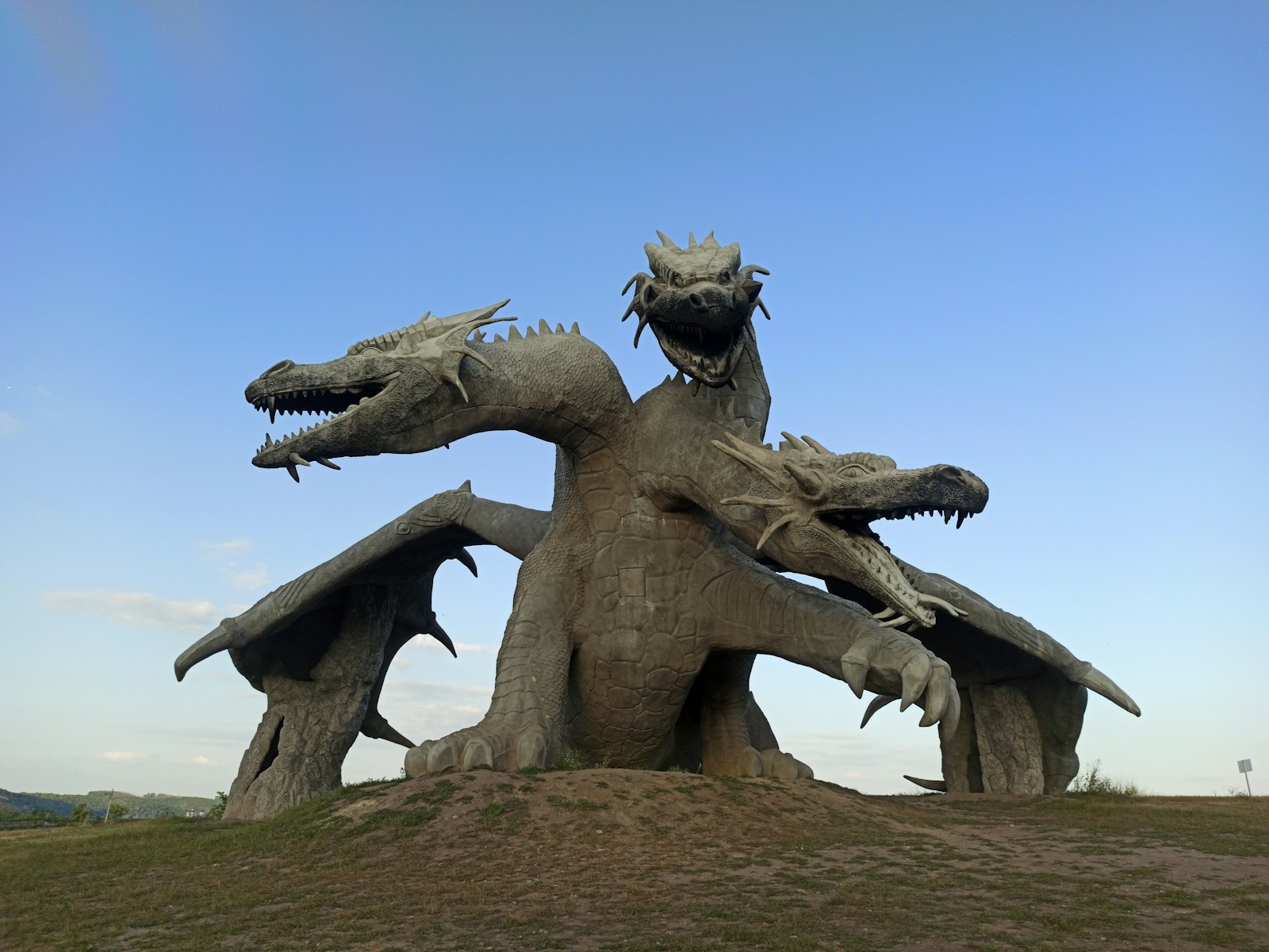 gray concrete statue under blue sky during daytime